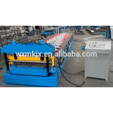 Steel deck floor forming machine